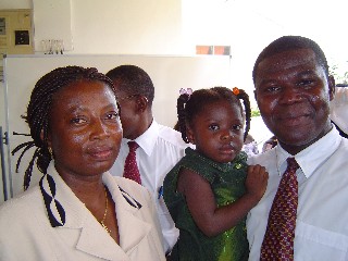 Local Bishop with his wife and daughter
